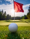 Golfball+flag. Close up of golfball with golfcourse as background Royalty Free Stock Photo