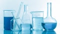 Laboratory bottles - test tubes and beakers - on white Royalty Free Stock Photo