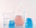 Laboratory bottles - test tubes and beakers - on white Royalty Free Stock Photo