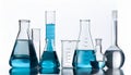 Laboratory bottles - test tubes and beakers - on white Royalty Free Stock Photo