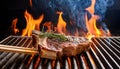 Spicy t-bone steak grilling over a summer barbecue. Spicy t-bone steak seasoned with rosemar Royalty Free Stock Photo