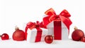 Christmas white gift boxes with red bow and balls isolated on white background. Royalty Free Stock Photo