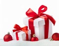 Christmas white gift boxes with red bow and balls isolated on white background. Royalty Free Stock Photo