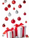 Christmas white gift boxes with red bow and balls isolated on white background. Royalty Free Stock Photo