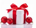 Christmas white gift boxes with red bow and balls isolated on white background. Royalty Free Stock Photo