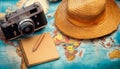 Holiday items on a world map. Royalty Free Stock Photo