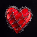 Heart in Barbed Wire on Black. A plastic heart wrapped in barbed wire fence. Valentines day Royalty Free Stock Photo