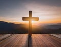 Good Friday and Easter Sunday concept. Wooden floor with blurred cross and sunset amazing Royalty Free Stock Photo
