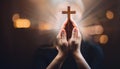 Person palm hands to hold holy cross, crucifix to worship. Royalty Free Stock Photo