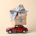 Car with staple gift on neutral background Royalty Free Stock Photo