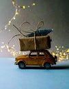 Car with staple gift on neutral background Royalty Free Stock Photo