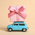 Car with staple gift on neutral background Royalty Free Stock Photo