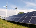 Energy park. Solar panel and eolic system on green park Royalty Free Stock Photo