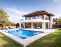 New modern house with backyard swimming pool on sunny day Royalty Free Stock Photo