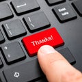 Thanks!. Hand press a red key with text Thanks on black keyboard. Royalty Free Stock Photo