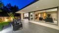 Horizontal view of modern patio at night Royalty Free Stock Photo