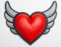 Red heart of an angel. Artistically painted red heart with angel wings gray, decorated Royalty Free Stock Photo
