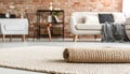 Beige carpet in modern living room interior with industrial furniture and brick wall Royalty Free Stock Photo