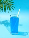 Blue Summer Juice. A summer concept with waves, palms and sunshine Royalty Free Stock Photo