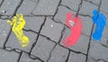 Colorful foot prints in paint Royalty Free Stock Photo