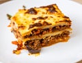 Moussaka as closeup on a white plate Royalty Free Stock Photo