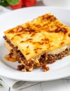 Moussaka as closeup on a white plate Royalty Free Stock Photo