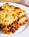 Moussaka as closeup on a white plate Royalty Free Stock Photo