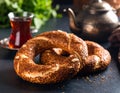Traditional Turkish Sesame Bagel (Simit) and Turkish Tea Royalty Free Stock Photo
