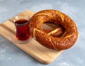 Traditional Turkish Sesame Bagel (Simit) and Turkish Tea Royalty Free Stock Photo