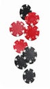 Black and red casino chips falling on white background Royalty Free Stock Photo