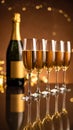 Brown background with blurry light on glasses of champagne and bottle on mirror surfa Royalty Free Stock Photo