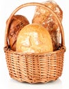 Different loaves of fresh bread in basket isolated on white Royalty Free Stock Photo