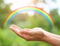 Woman and rainbow as source of healing energy on sunny day, closeup Royalty Free Stock Photo