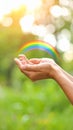 Woman and rainbow as source of healing energy on sunny day, closeup Royalty Free Stock Photo