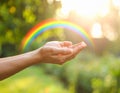 Woman and rainbow as source of healing energy on sunny day, closeup Royalty Free Stock Photo