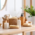 Different bathing products on light wooden table in bathroom Royalty Free Stock Photo