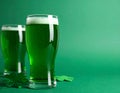 Tasty green beer on color background, space for text. St. Patrick\'s Day celebration Royalty Free Stock Photo