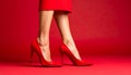 Woman in elegant shoes on red background Royalty Free Stock Photo