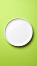 One ceramic plate on color background, top view Royalty Free Stock Photo