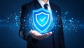 Cyber insurance concept. Man demonstrating shield illustration as symbol of protectio Royalty Free Stock Photo