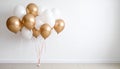 Balloon garland near white wall in room. Festive decor Royalty Free Stock Photo