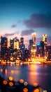 Bright glowing lights of district in megapolis under dusk sky in evening on blurred Royalty Free Stock Photo