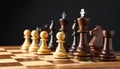 Many chess pieces on wooden checkerboard against black background, selective focus Royalty Free Stock Photo