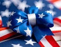 Indepedence Day 4th July emblem with a blue stars bow and curly red and white ribbon Royalty Free Stock Photo