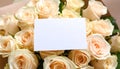 Bouquet of beautiful roses with blank card, closeup Royalty Free Stock Photo