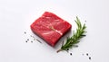 Piece of raw beef meat and rosemary isolated on white Royalty Free Stock Photo
