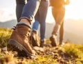 Group of people climbing up mountains, focus on hiking boots Royalty Free Stock Photo