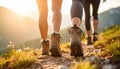 Group of people climbing up mountains, focus on hiking boots Royalty Free Stock Photo