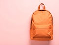 Stylish orange backpack on light background, top view. Space for text Royalty Free Stock Photo