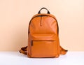 Stylish orange backpack on light background, top view. Space for text Royalty Free Stock Photo